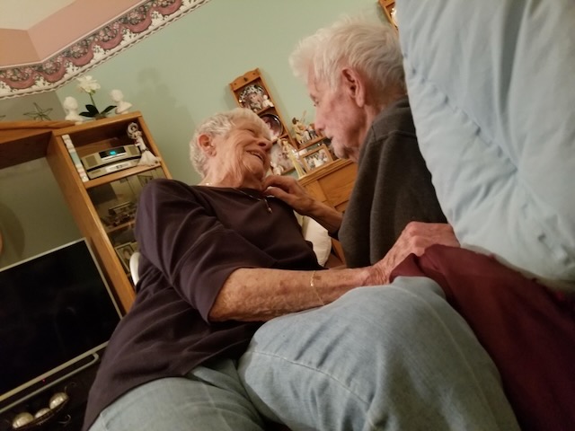 Grandpa sitting on grandpa's lap a few days before he passed