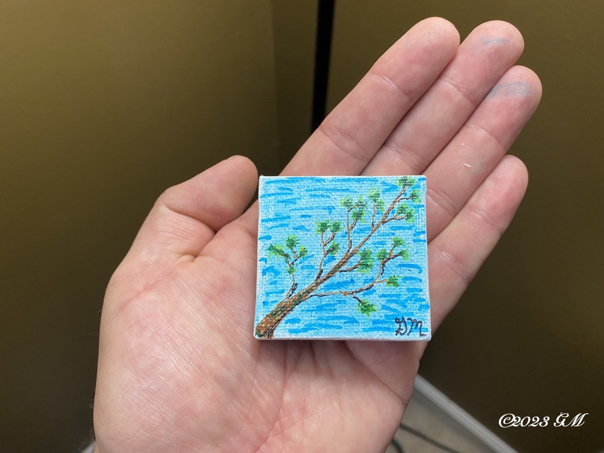 Spring on My Mind painting in the palm of my hand