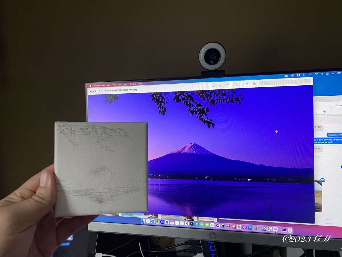 Sketch of Sunset on Fuji being held up in front of the reference photo